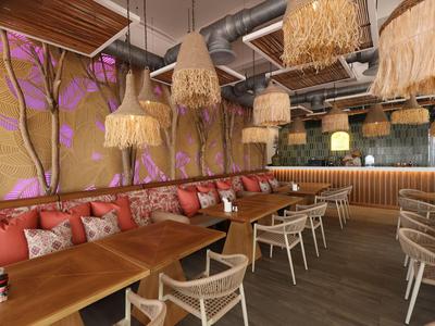 Gemütlicher Hotel-Loungebereich mit rot gepolsterten Sofas, Holztischen und dekorativen Lampen.