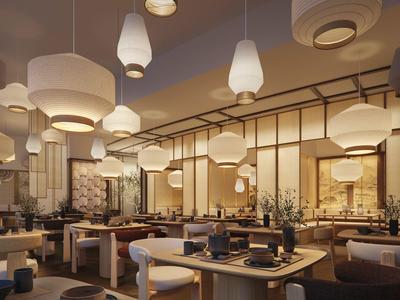 Interior moderno de restaurante con iluminación cálida y lámparas colgantes elegantes.