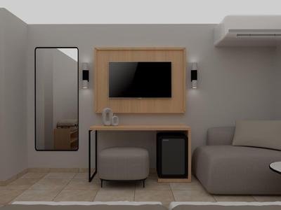 Moderní hotelový pokoj s pohovkou, televizí, zrcadlem a klimatizací v neutrálních barvách.