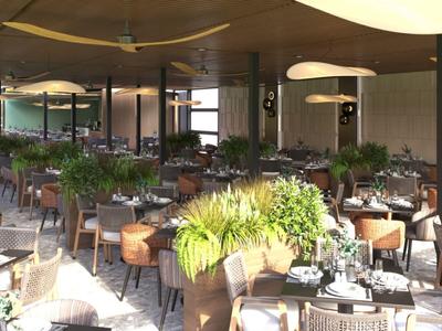 Modernes Hotelrestaurant mit elegant gedeckten Tischen und grünen Pflanzen als Dekoration.