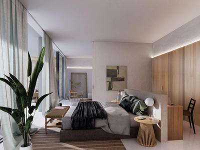 Modernes Hotelzimmer mit großem Bett, Pflanzen und Holzvertäfelung an der Wand.