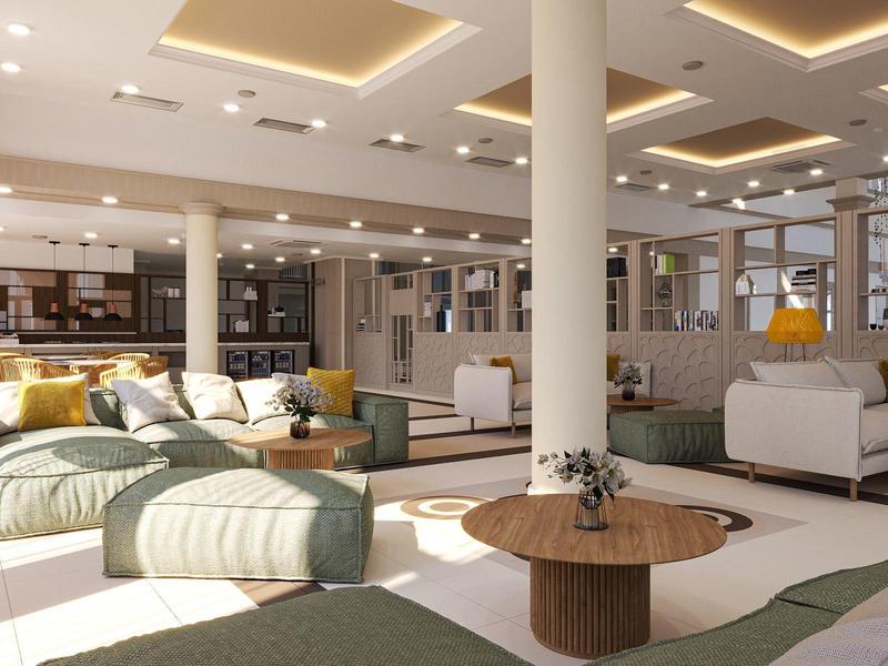 Bright, modern hotel lounge with cozy seating and warm lighting.