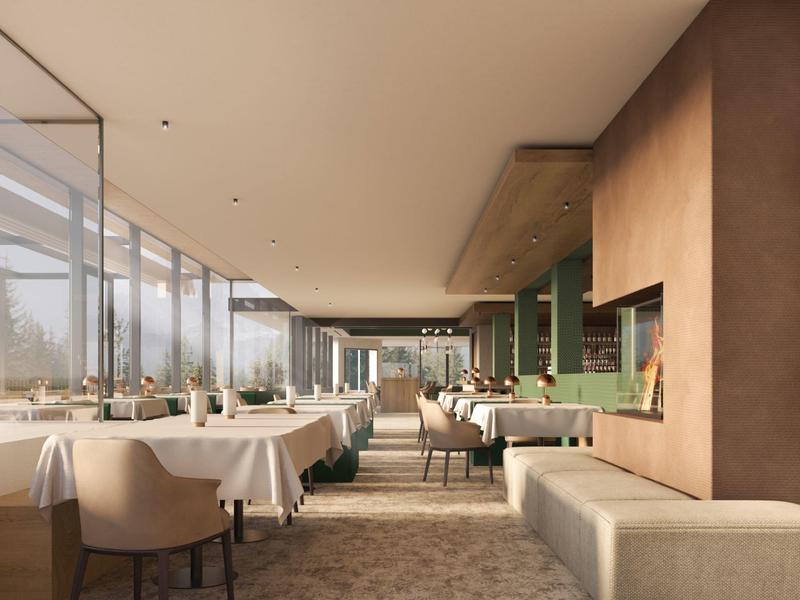 Helles, modernes Restaurant mit Tischreihen, Stühlen und großen Fenstern für Tageslicht.