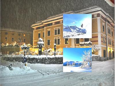 Hôtel sous la neige avec deux images encastrées de montagnes enneigées et de ski.
