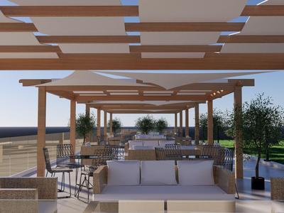 Modern outdoor area with seating and pergolas, overlooking the sea.