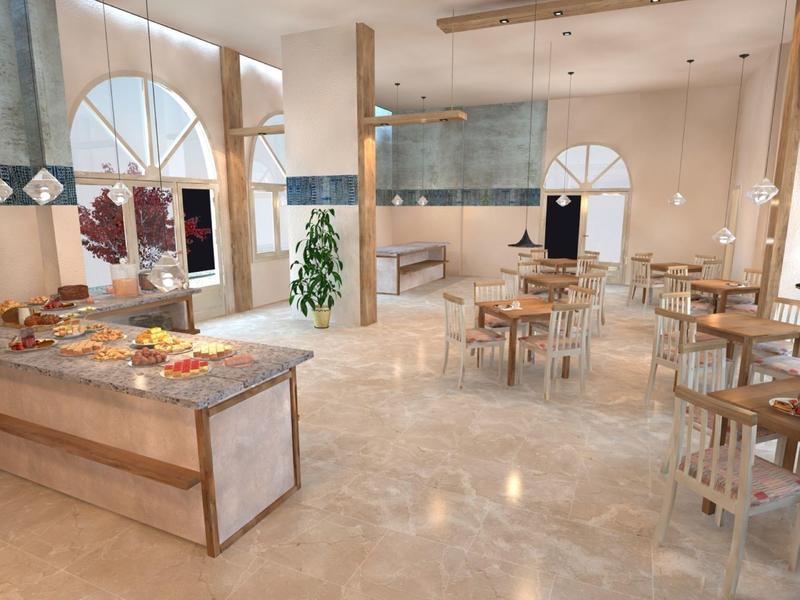 Světlá hotelová restaurace s kulatými dřevěnými stoly, mnoha židlemi a bufetem s občerstvením.