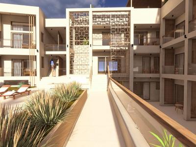 Complejo hotelero moderno con patio y acceso a la piscina en un entorno soleado.