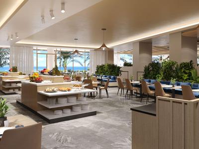 Ristorante moderno in hotel con buffet e vista mare, luminoso e accogliente.