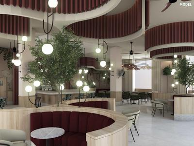 Modernes Hotelrestaurant mit abgerundeten Sitzbereichen, runden Tischen und hängenden Lampen.