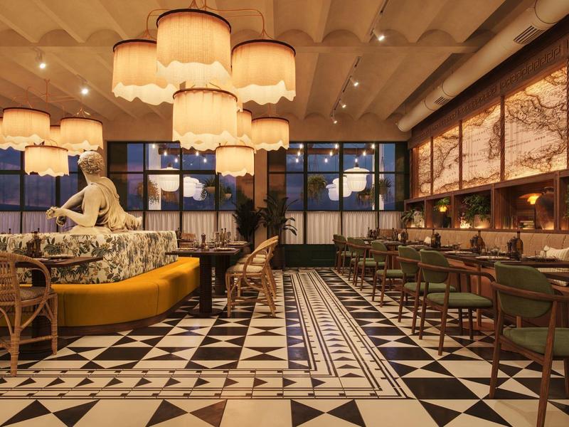 Ristorante elegante dell'hotel con piastrelle decorative e grandi lampade.