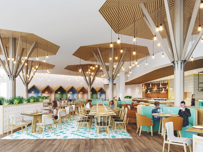 Modernes Hotelrestaurant mit Holzakzenten, hellen Lampen und gemütlichen Sitzbereichen