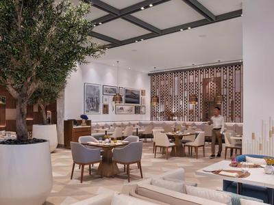 Modernes Restaurant mit großen Pflanzen, runden Holztischen, grauen Stühlen und heller Decke.