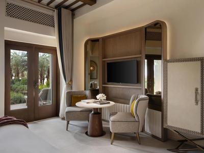 Modern bike rental with illuminated wooden counter and bike helmets.