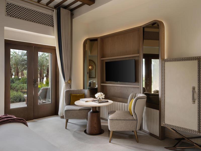 Modern bike rental with illuminated wooden counter and bike helmets.