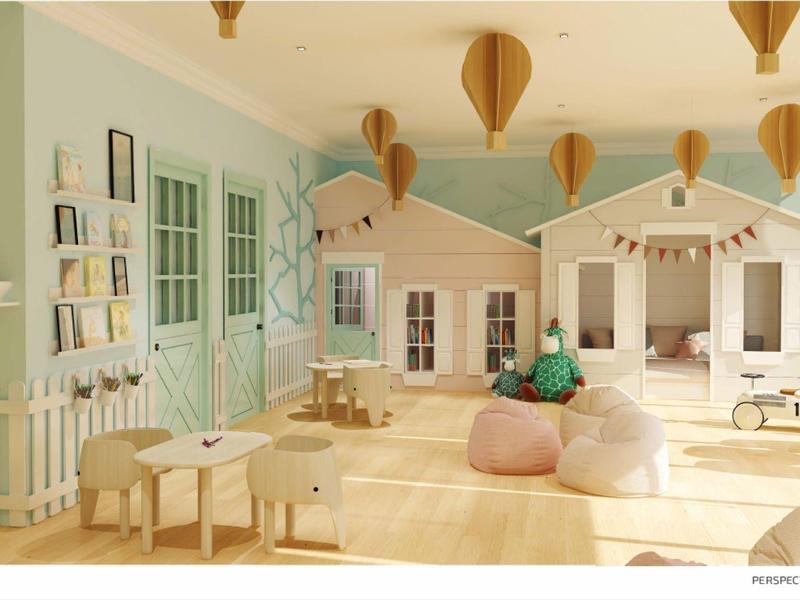 Hell eingerichteter, moderner Kindergarten mit pastellfarbenen Möbeln und spielerischen Wandelementen.