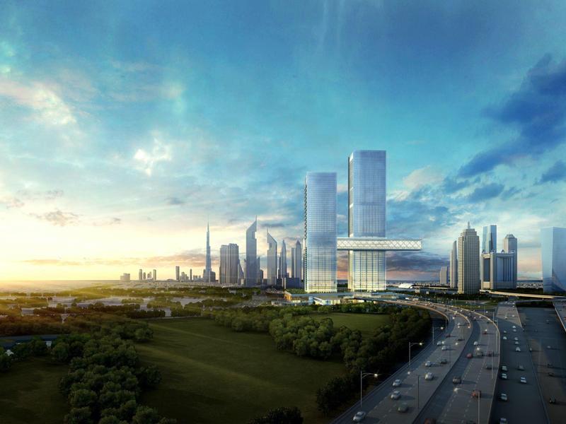 Cityscape with modern skyscrapers and busy road at sunset.