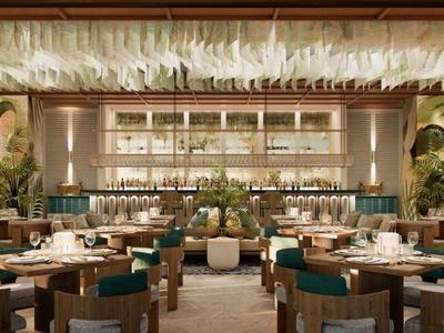 Elegant restaurant with modern furniture and decorative plants.