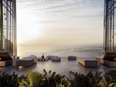 Luxe terras met zwembad en zeezicht bij zonsopgang.