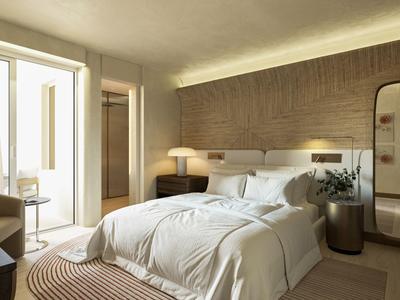 Modernes Hotelzimmer mit Doppelbett, Holzverkleidung und natürlichem Licht.