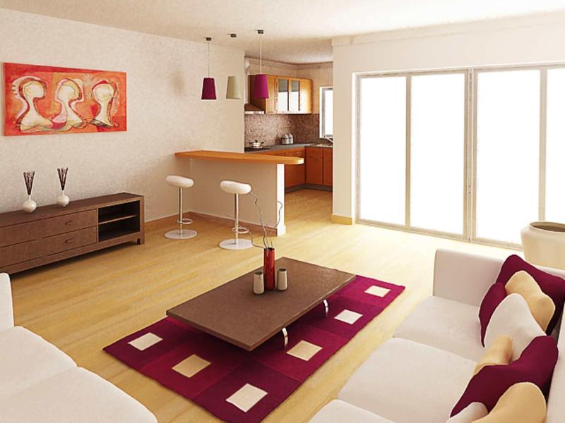 Helles Wohnzimmer mit weißen Sofas, rotem Teppich, Holzboden und Küchenbar mit Hockern.