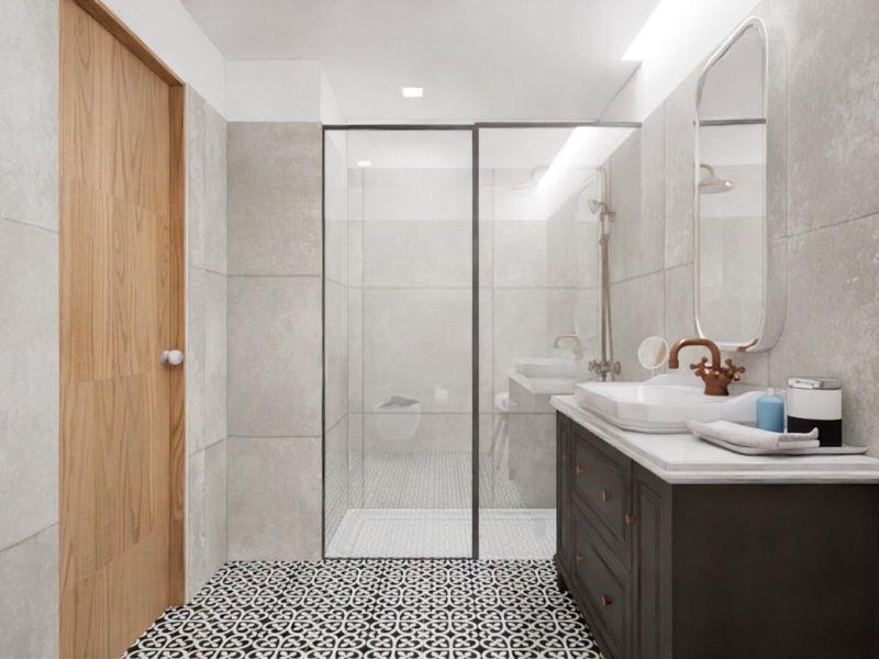 Modernes Badezimmer mit heller Beleuchtung, Duschkabine, Holz- und grauen Oberflächen