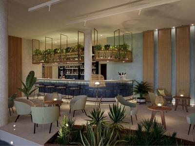 Modern hotel bar with blue counter, hanging plants, and seating area with light chairs.