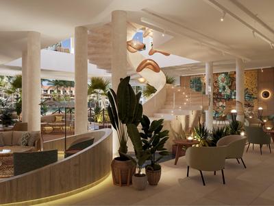 Helles Hotellobby mit geschwungener Treppe, modernen Sitzgruppen und großen Pflanzen.