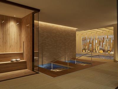 Modern spa room with wooden sauna, pool, and warm ambient lighting.