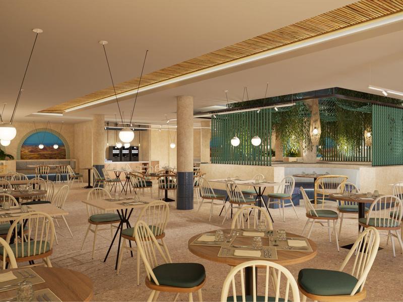 Spacious modern dining area with wooden chairs, round tables, and pendant lights in a hotel setting.