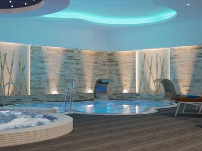 Moderner Wellnessbereich mit Whirlpool, Pool, Säulen und stimmungsvoller indirekter Beleuchtung.