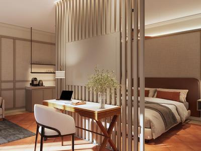 Moderner Hotelzimmerbereich mit Trennwand, Schreibtisch, Sessel und großem Bett in warmen Farben.