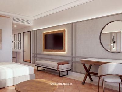 Modernes Hotelzimmer mit großem Bett, rundem Spiegel und Holzmöbeln in warmen Tönen.