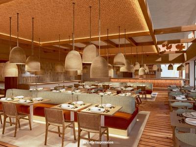 Ristorante accogliente con mobili in legno, lampade sospese e interni luminosi.