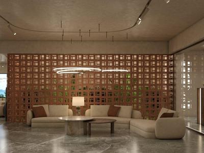 Moderne lounge met bank, fauteuils en tafel voor een decoratieve bakstenen muur.