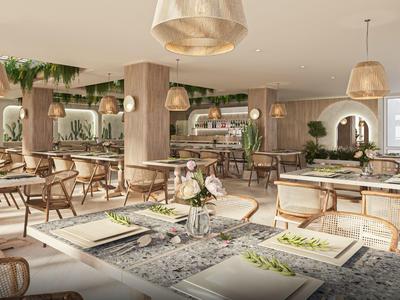 Helles Restaurant mit Holzstühlen, grünen Pflanzen und moderner Dekoration.