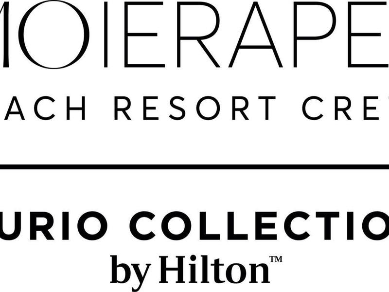 Schwarzer Text auf weißem Hintergrund mit Schriftlogo und Angaben zum Strandresort auf Kreta.