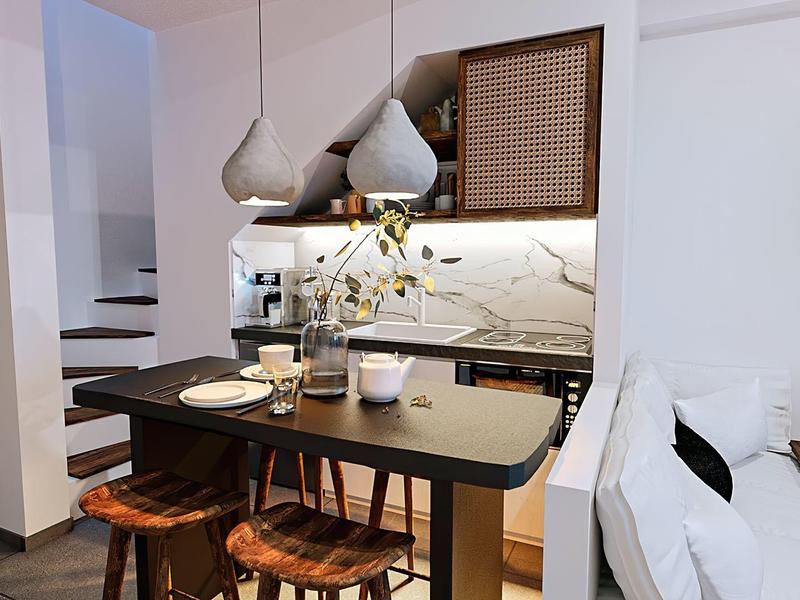 Moderne open keuken met bar, houten krukken en elegante leefruimte in een appartement.