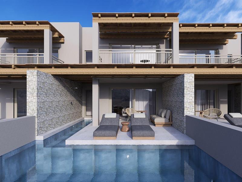 Terrazza moderna con piscina privata e sedute confortevoli sotto un cielo azzurro.