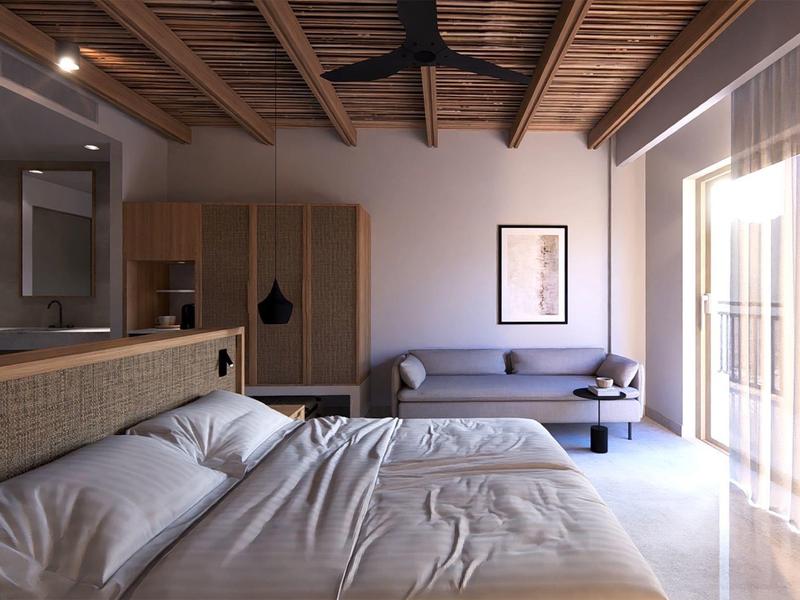 Camera moderna con letto matrimoniale, divano, balcone e soffitto in legno.