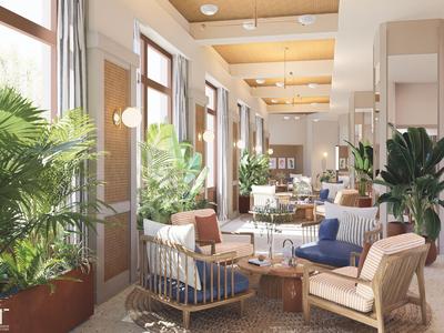 Lichte, gezellige lounge met grote ramen, planten en moderne houten meubelset.