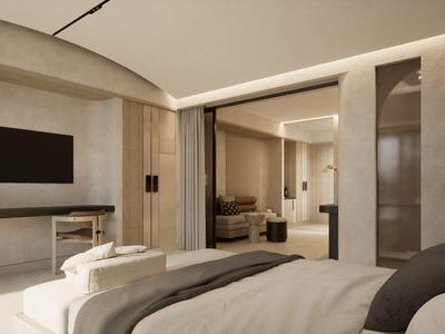 Modernes Hotelzimmer mit großem Bett, Fernseher und stilvoller Einrichtung in neutralen Farben.