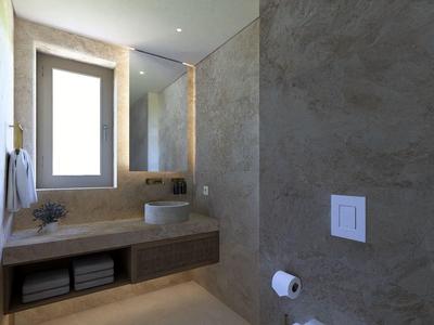 Moderne badkamer met raam, wastafels en grijze muren in een hotelkamer.