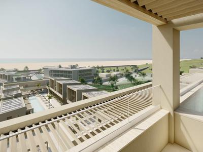 Uitzicht vanaf een balkon op een modern hotelresort met zwembad en groen onder een heldere lucht.