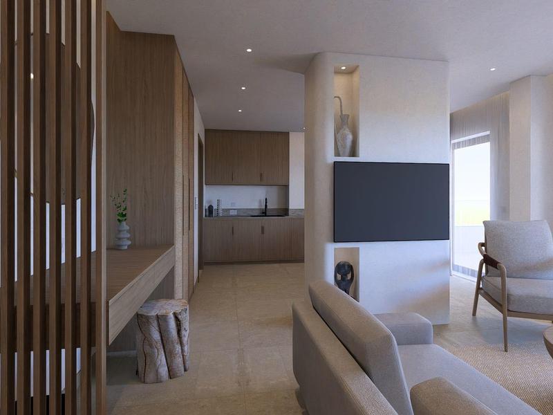 Modern ingerichte woonkamer met fauteuils, houten elementen en uitzicht op de keuken.