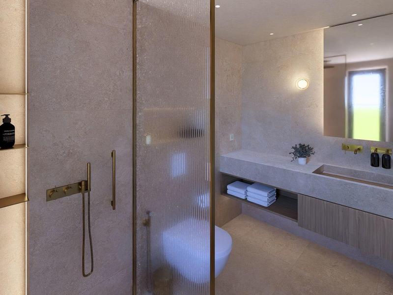 Moderne badkamer met douche, toilet, wastafel en verlichte plank