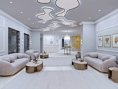 Moderner, heller Lounge-Bereich mit geschwungenem Deckendesign, grauen Sofas und runden Tischen.