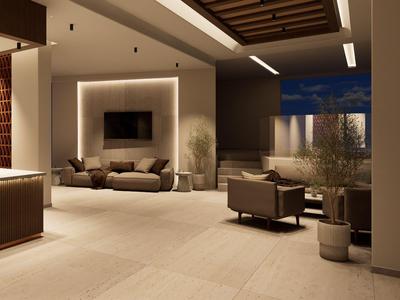 Moderner, eleganter Hotel-Loungebereich mit Sitzgruppen und sanfter Beleuchtung am Abend.