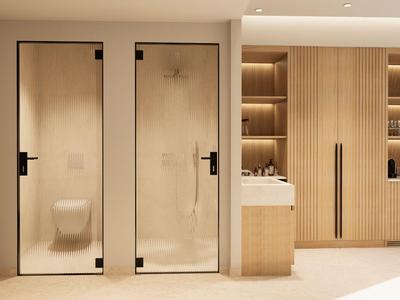 Moderner Badezimmerbereich mit zwei Türen, einem Waschbecken und einem hölzernen Schrank.