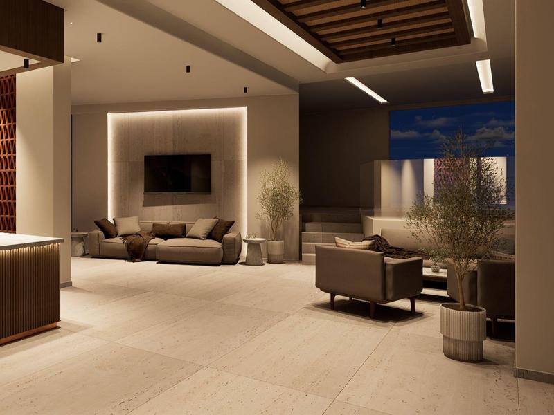 Moderner Hotel-Loungebereich mit gemütlichen Sitzmöbeln und warmem Beleuchtungskonzept.