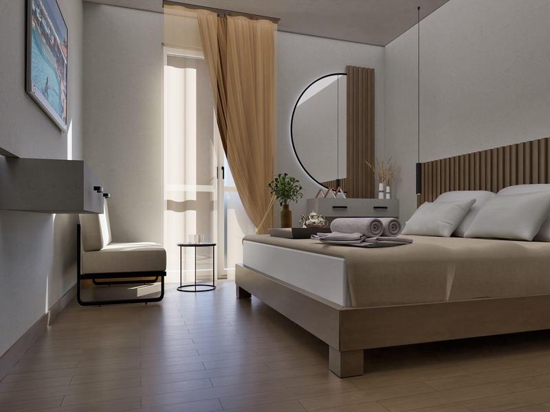 Nowoczesny pokój hotelowy z podwójnym łóżkiem, fotelem, telewizorem i balkonem z zasłonami.